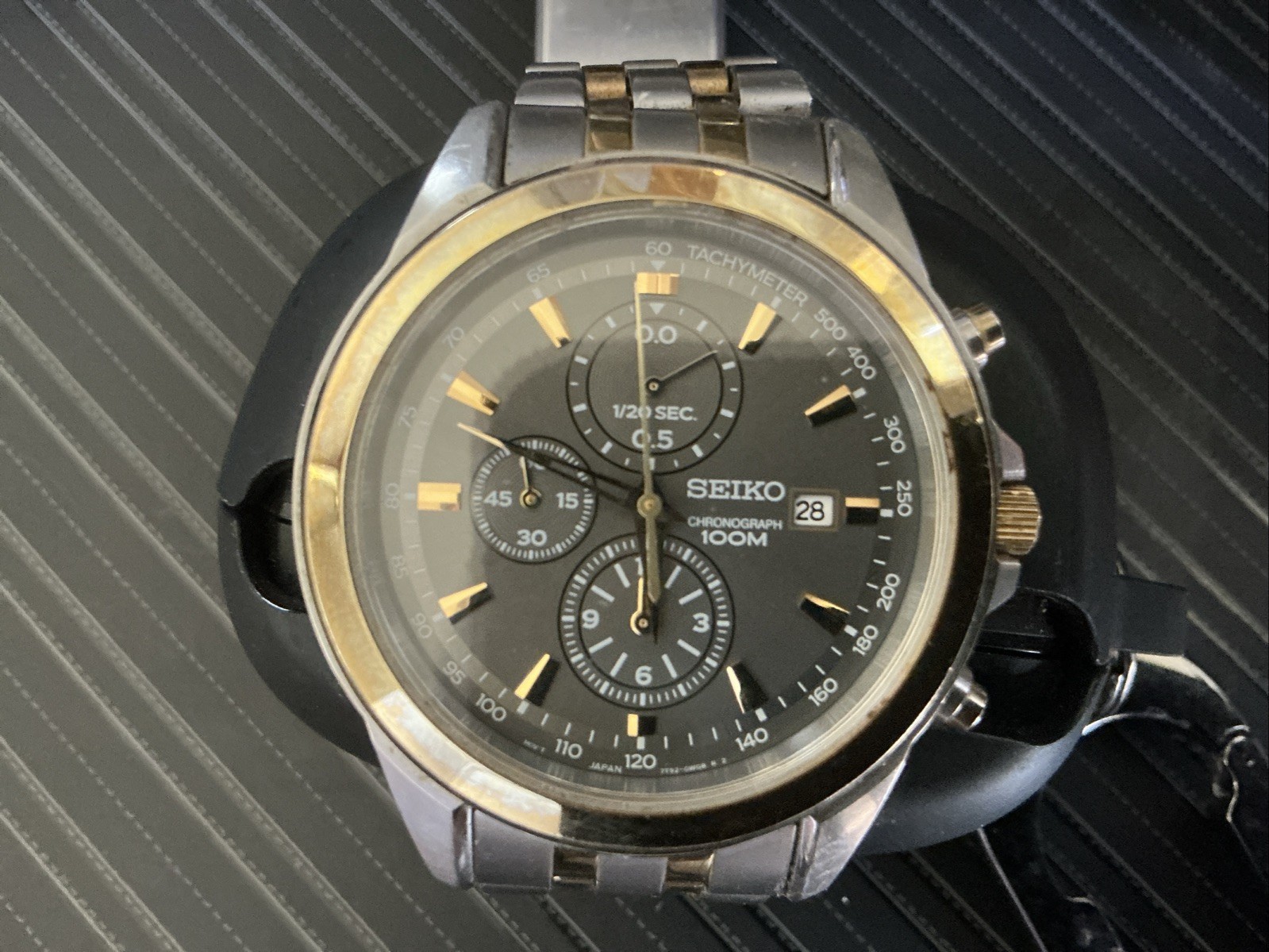 Seiko Men’s Chronograph, Tachymeter 100m, Date, Black Dial Silver/Gold, Bracelet Seiko Men’s Chronograph, Tachymeter 100m, Date, Black Dial Silver/Gold, Bracelet