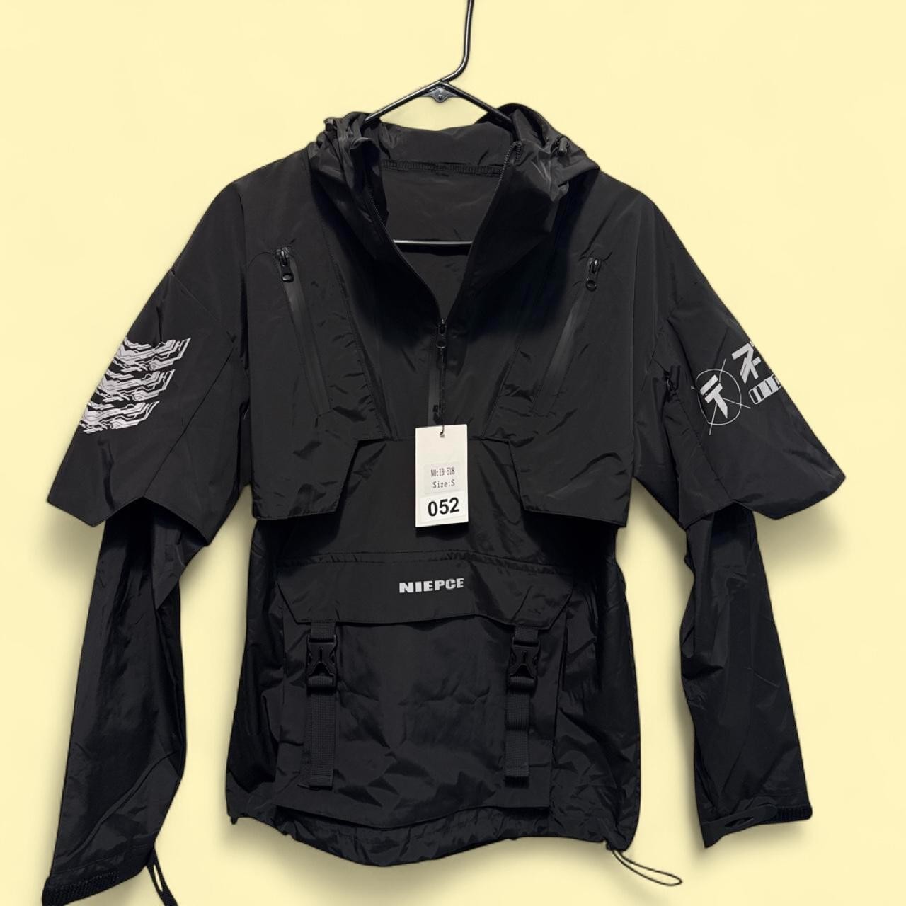 NIEPCE black windbreaker jacket with white logo on sleeve
