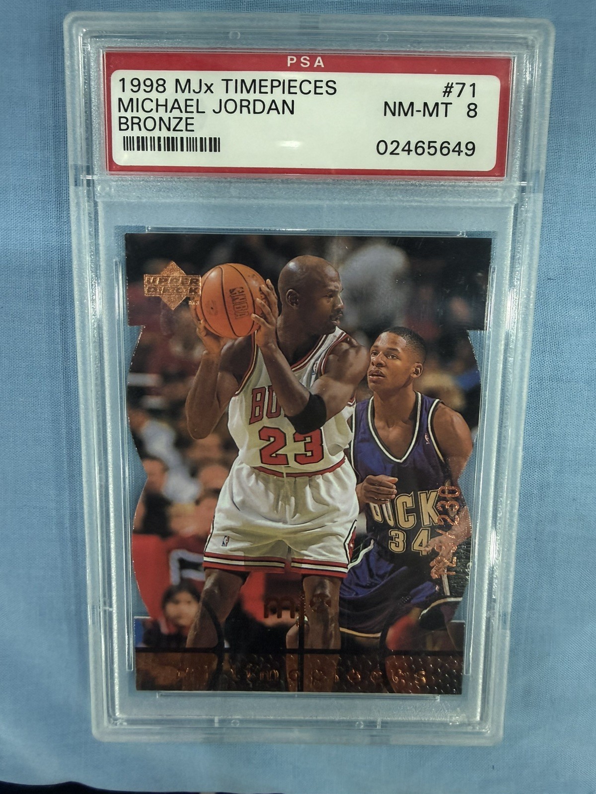 1998 Upper Deck MJX Michael Jordan #71  Timepieces Bronze #123/230 JERSEY MATCH