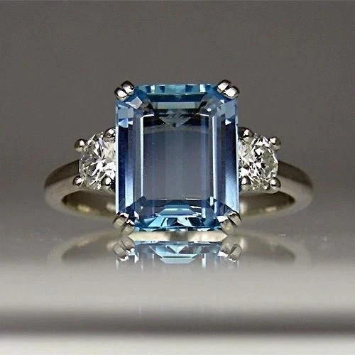 2.30 Ct Sky Blue Topaz and Diamond Emerald Cut Ring in 14k White Gold
