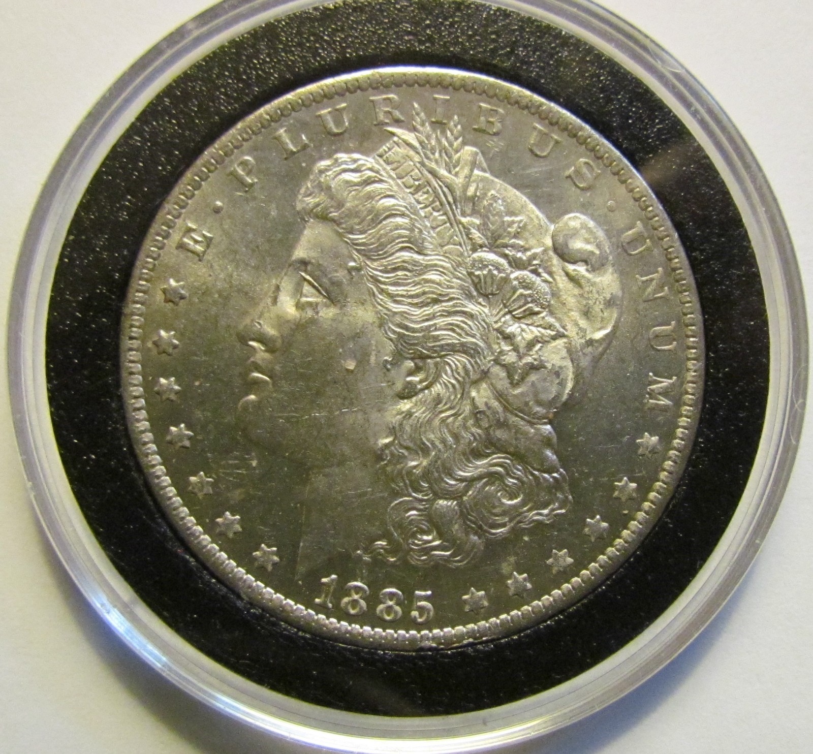 1885-O $1 Morgan Silver Dollar P.L. Rev
