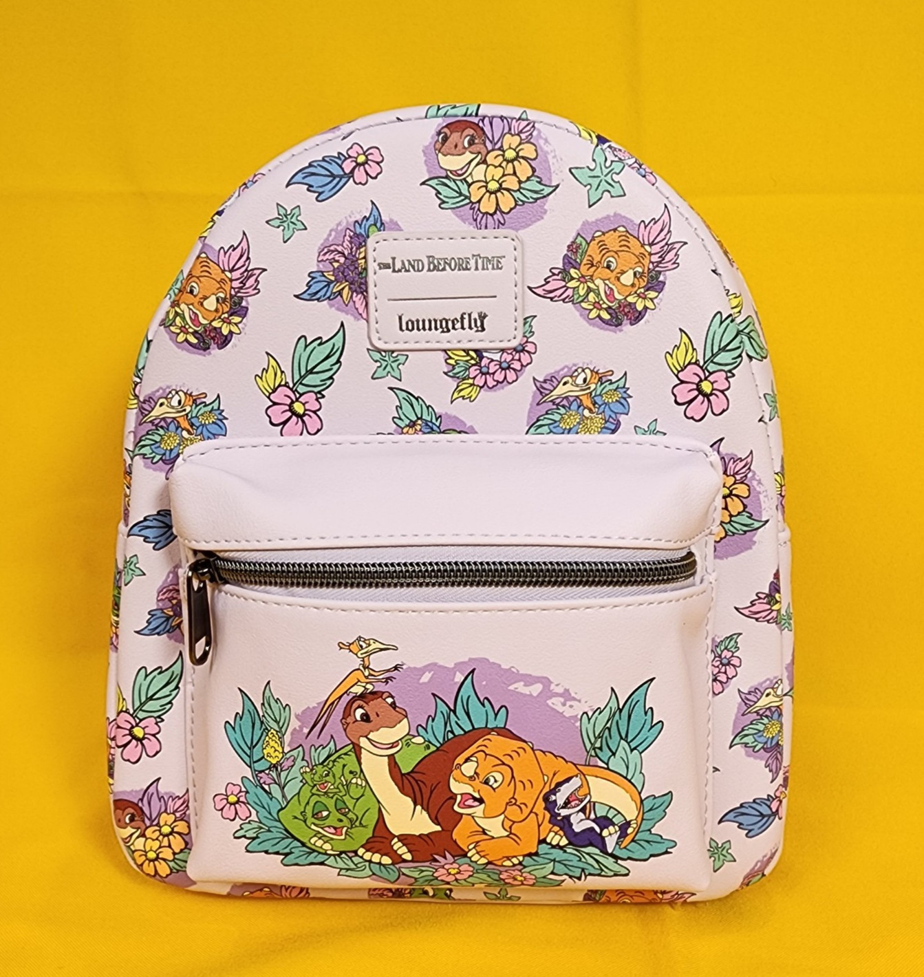 Loungefly The Land Before Time Dinosaurs Floral Purple Soft Tag Mini Backpack Loungefly The Land Before Time Dinosaurs Floral Purple Soft Tag Mini Backpack