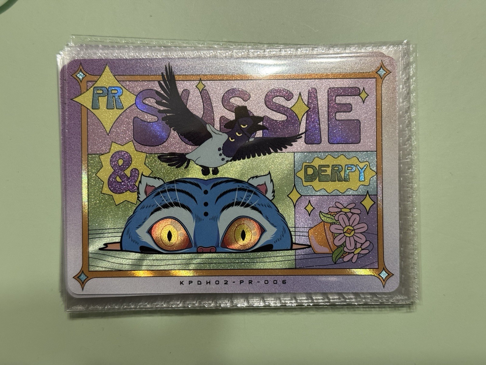 NYCC 2026 Kayou Kpop Demon Hunters Sussie & Derpy Promo Card NYCC 2026 Kayou Kpop Demon Hunters Sussie & Derpy Promo Card