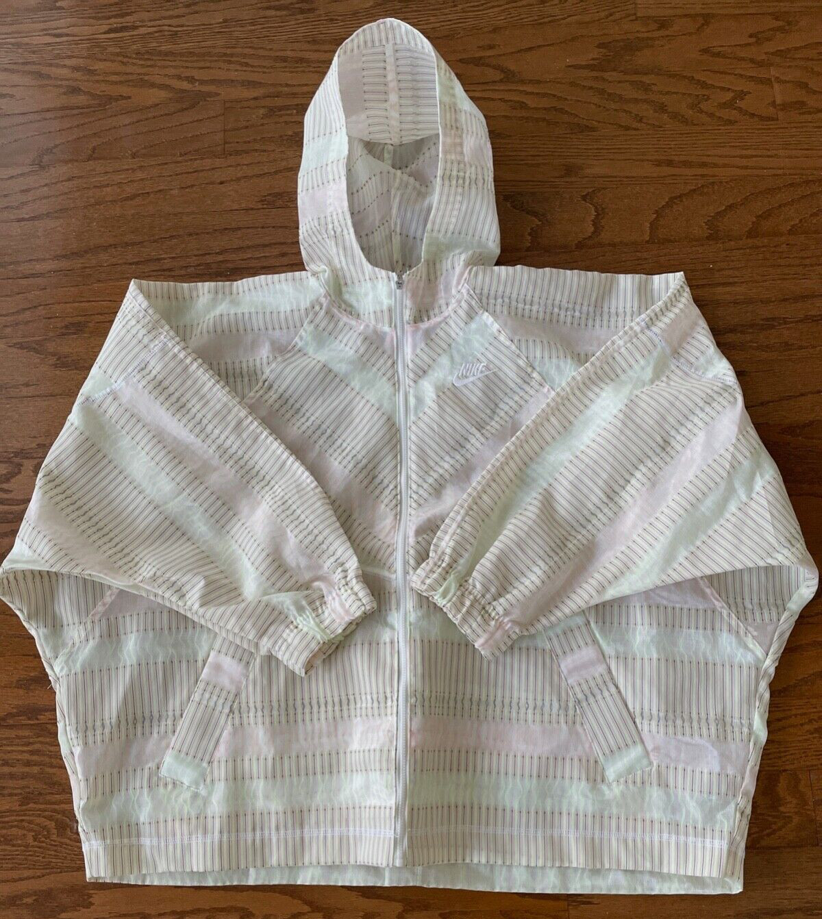 NWOT NIKE x Earth Day Wind Runner Full Zip Hooded Jacket Oversized Wms Small NWOT NIKE x Earth Day Wind Runner Full Zip Hooded Jacket Oversized Wms Small