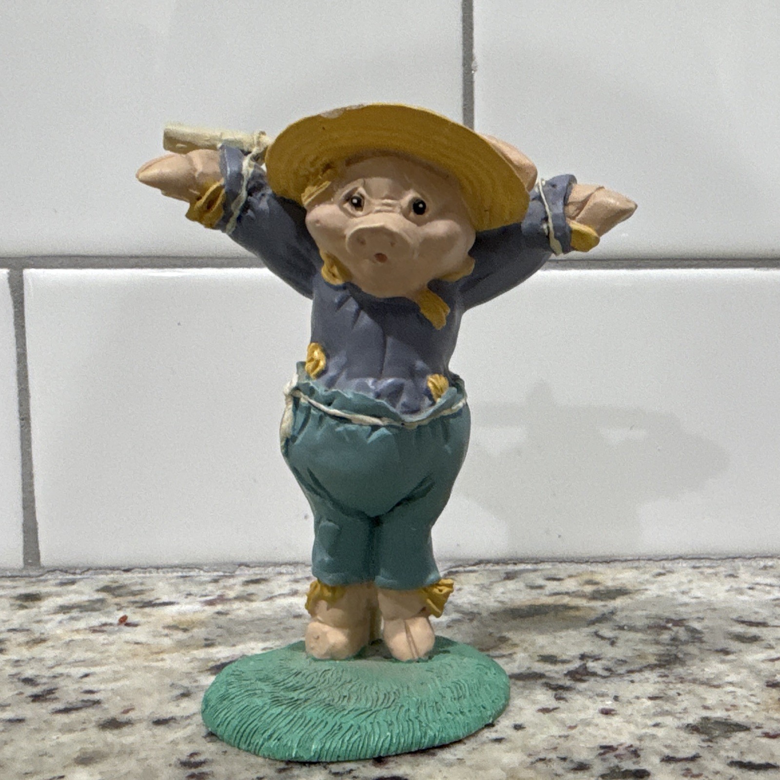 Vintage Enesco pig scarecrow figurine designed by artist Kathy Wise. Vintage Enesco pig scarecrow figurine designed by artist Kathy Wise.