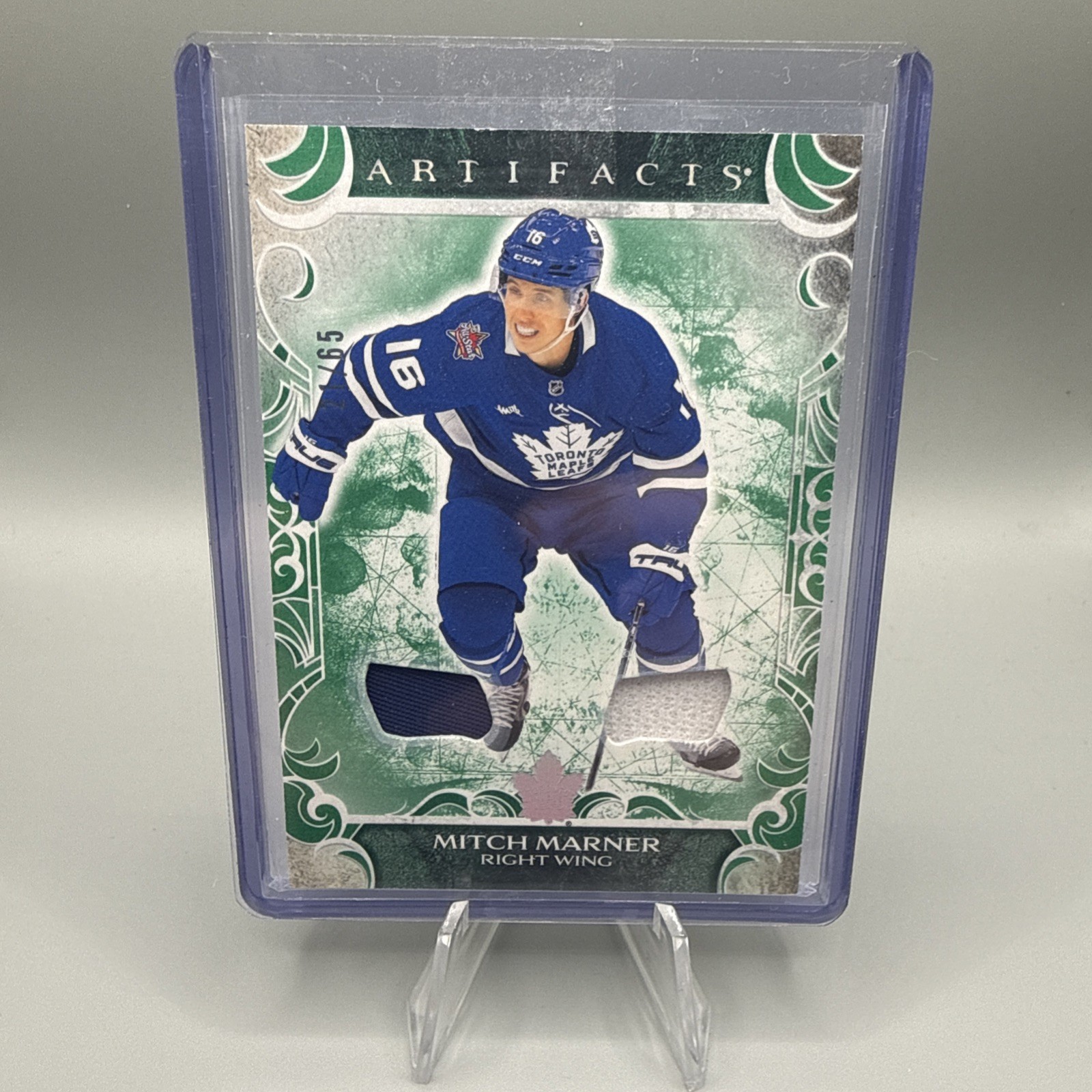 2024-25 Upper Deck Artifacts - Mitch Marner #9 Emerald Materials /65