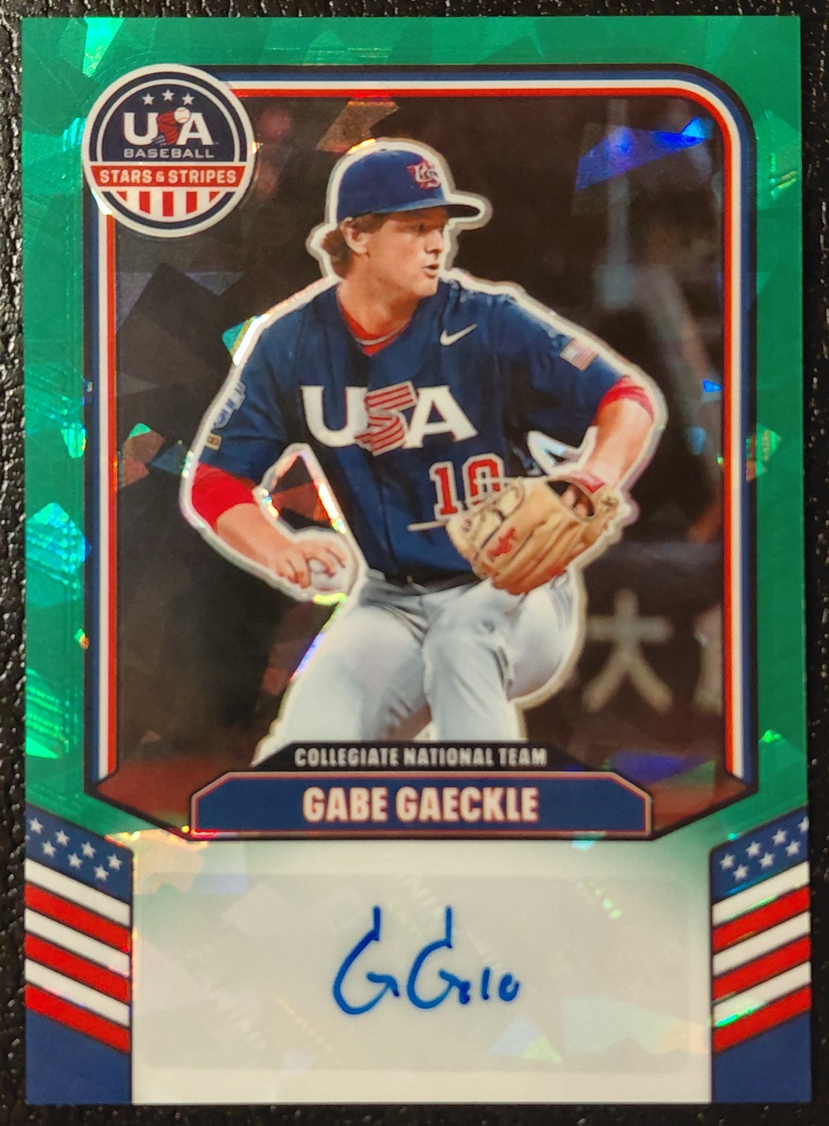 2026 USA Baseball Stars Stripes Gabe Gaeckle #CNT-GG Green Ice Prizm Auto /99 2026 USA Baseball Stars Stripes Gabe Gaeckle #CNT-GG Green Ice Prizm Auto /99