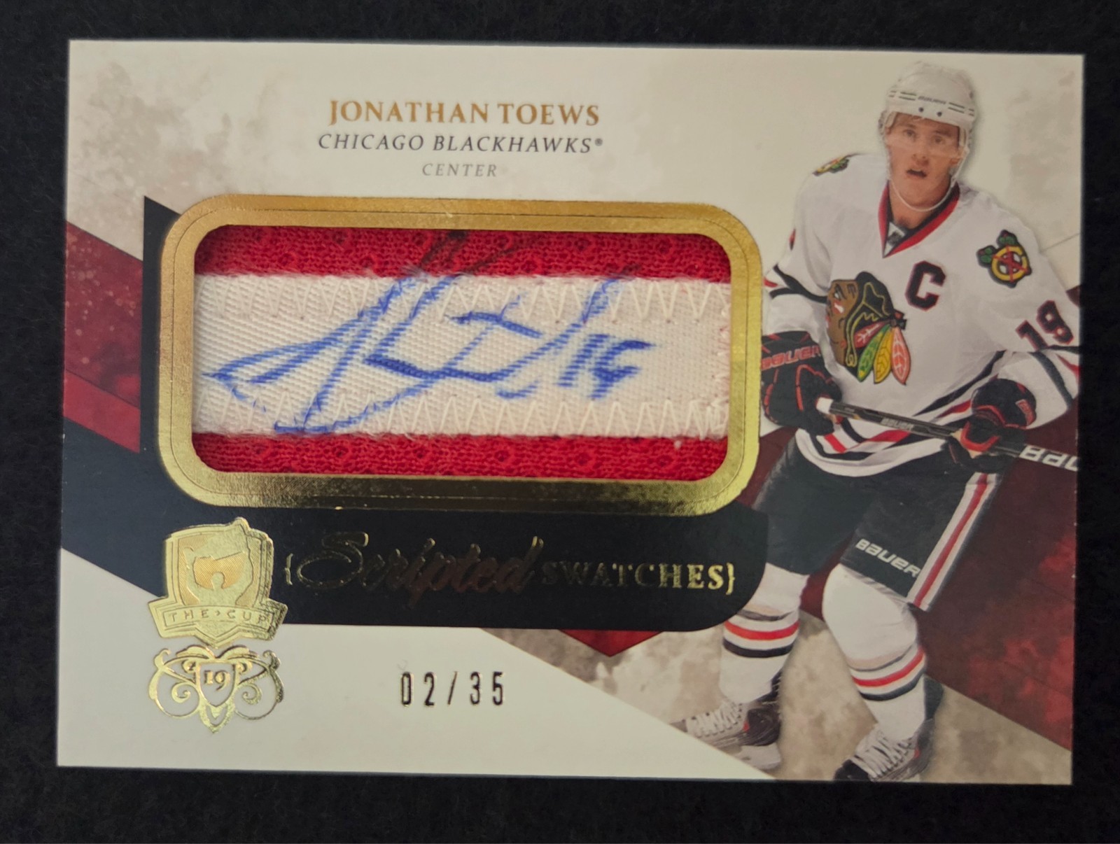 2010-11 The Cup Scripted Swatches Jonathan Toews 2/35 Signature Card #SS-JT