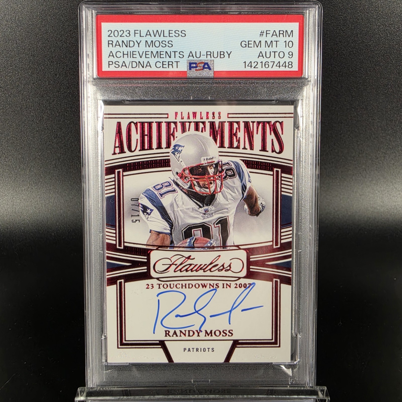 Randy Moss 2023 Panini Flawless Achievements Auto Ruby 7/15 PSA 10 