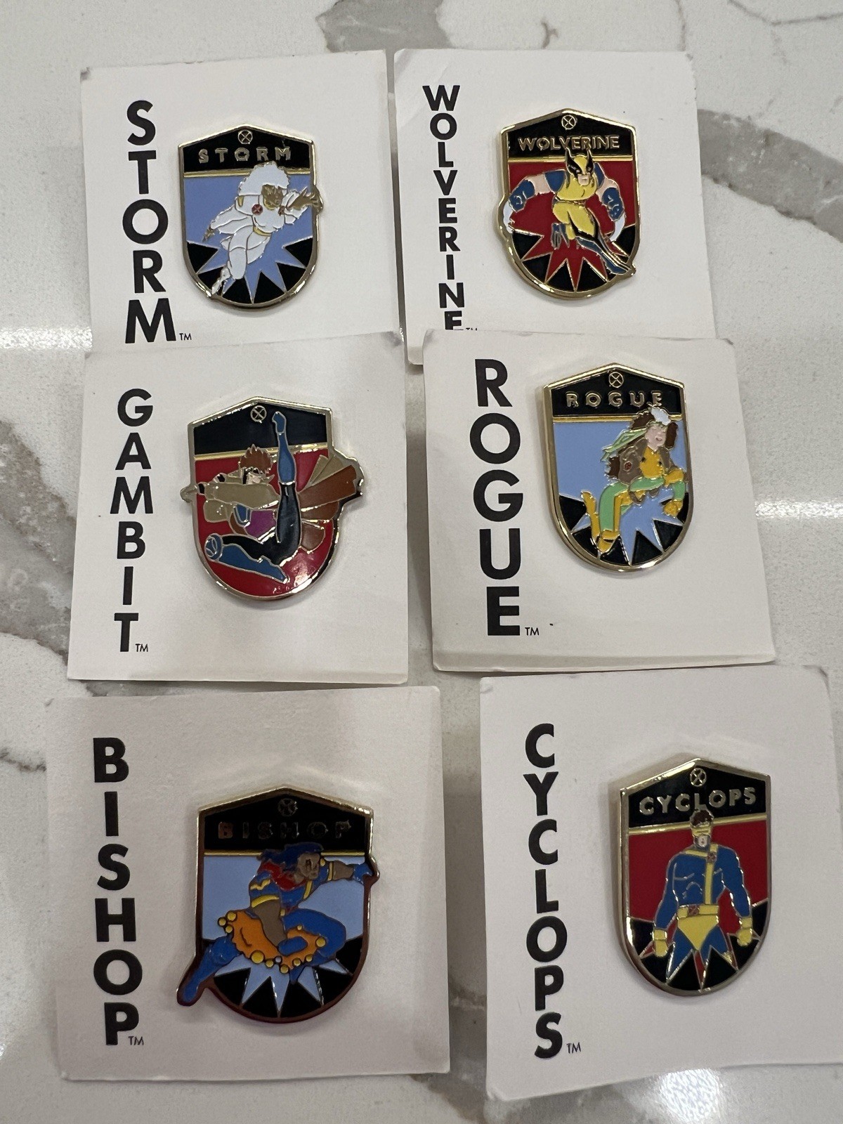 Vintage 1993 Marvel Universe X-Men character lapel pins by Planet Studios. Vintage 1993 Marvel Universe X-Men character lapel pins by Planet Studios.