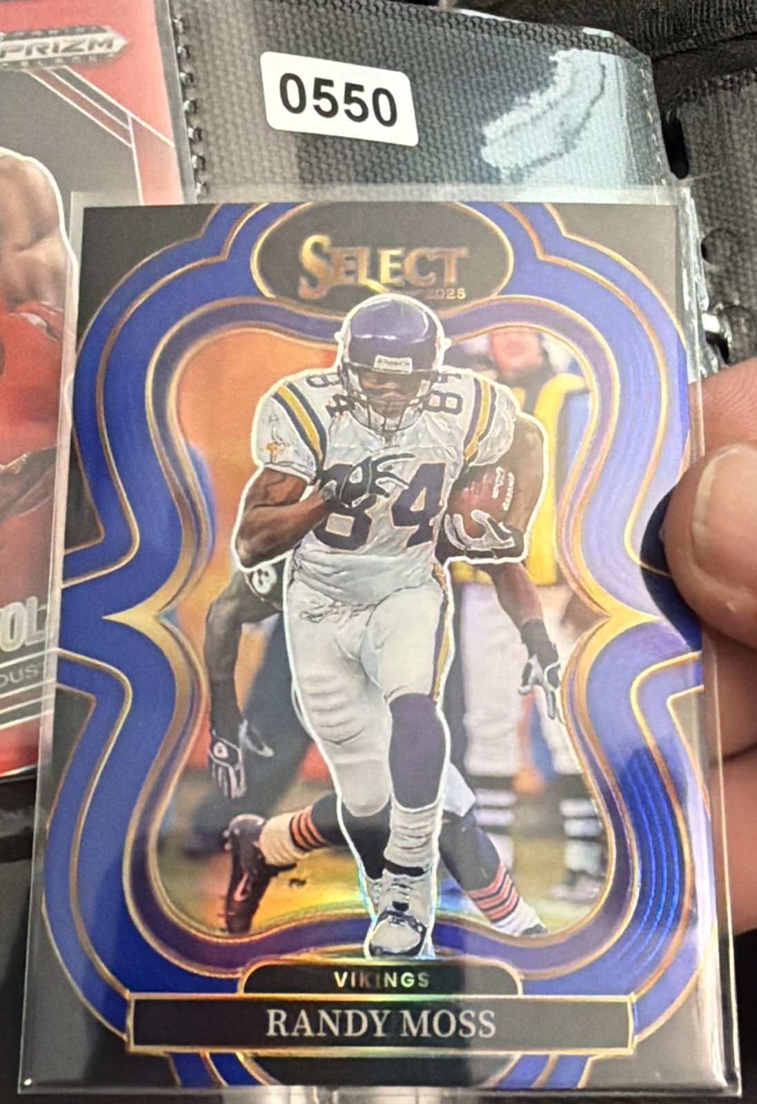 2025 Panini Select - Suite Level Randy Moss #400 Blue Prizm /99 (550)
