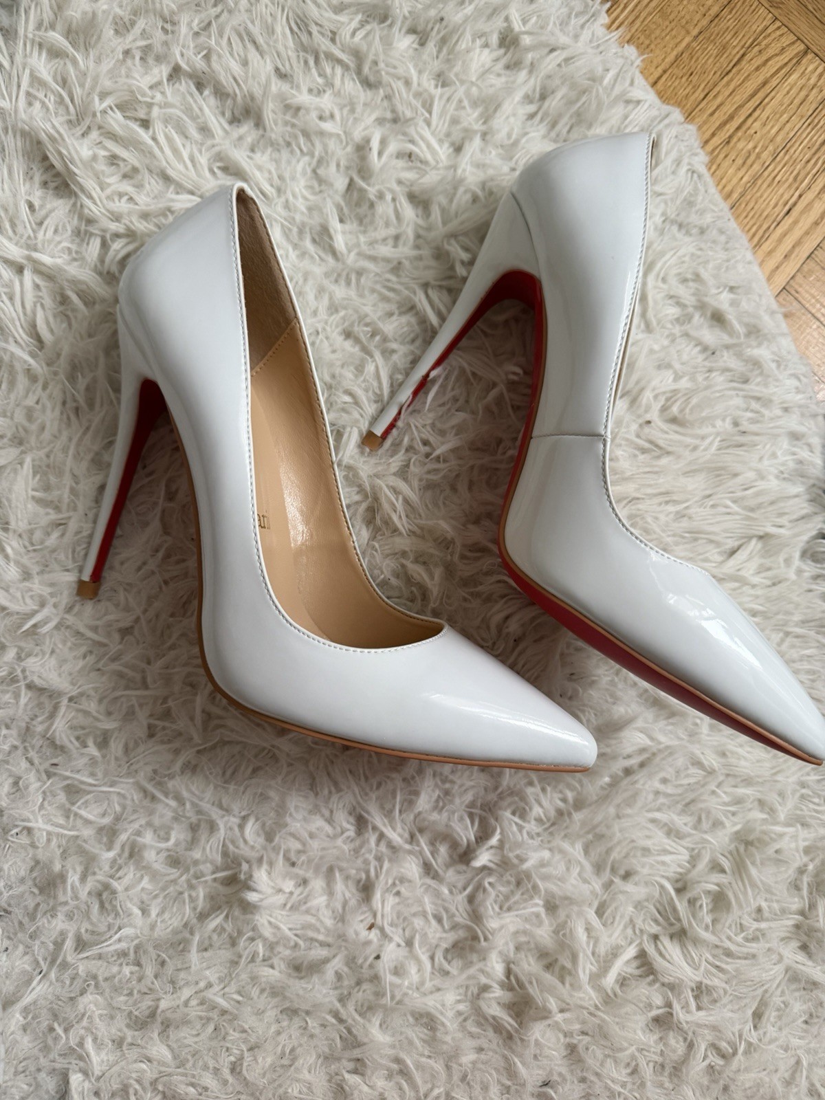White Christian Louboutin heels size 9