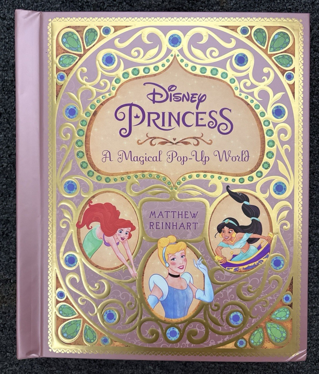 Disney Princess: A Magical Pop-Up WorldBy Matthew Reinhart LIKE NEW