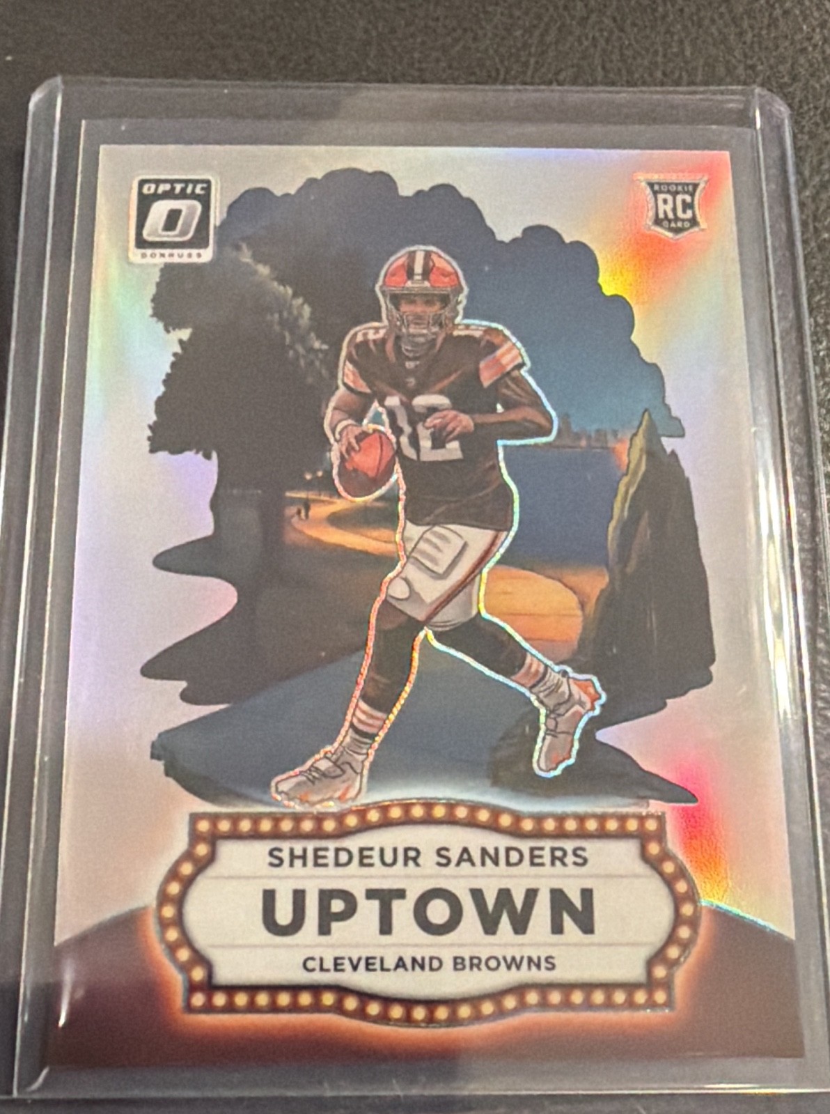 2025 Panini Donruss Optic - Uptowns Shedeur Sanders #18 (RC) 2025 Panini Donruss Optic - Uptowns Shedeur Sanders #18 (RC)