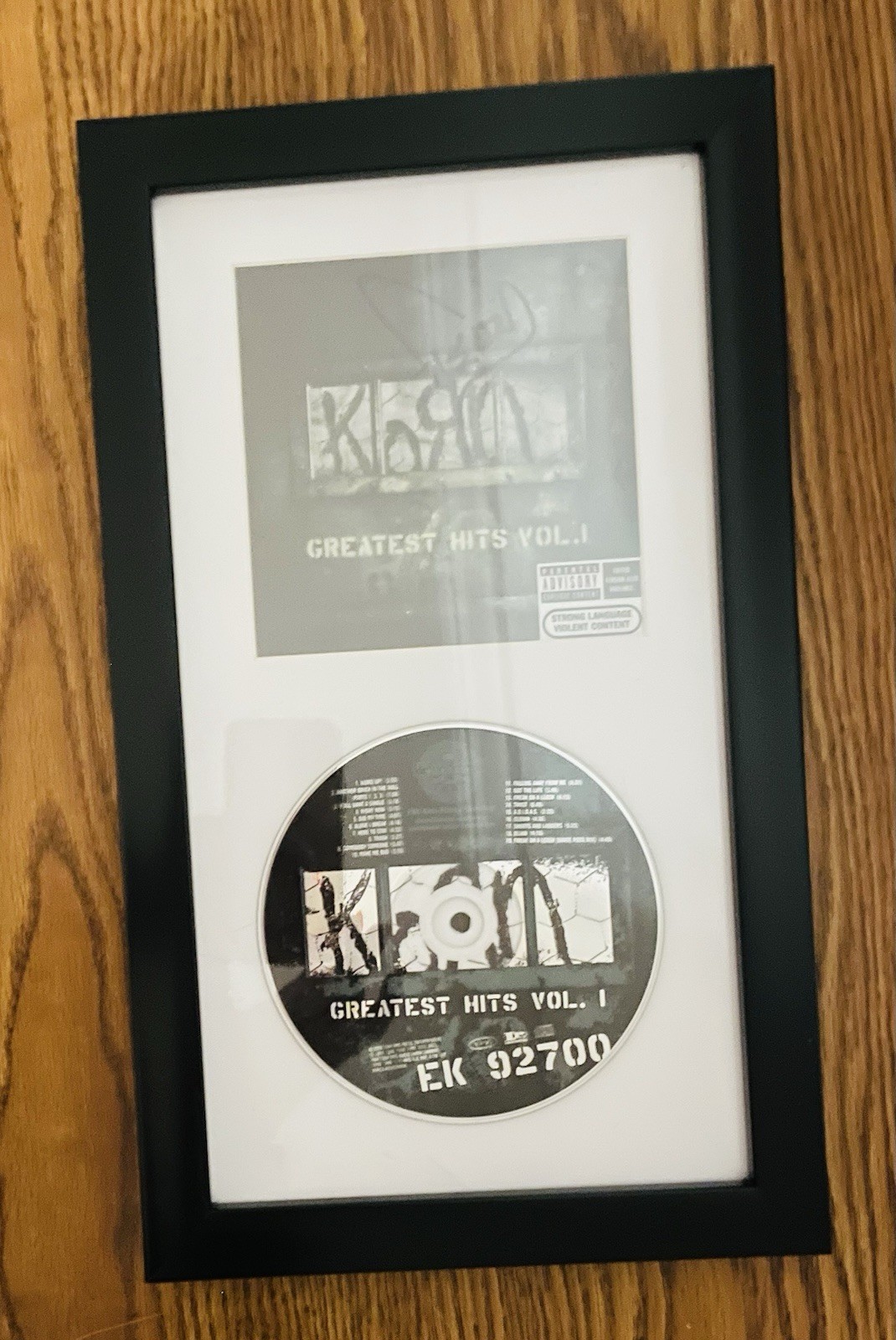 Korn Greatest Hits CD Framed And signed by Reginald ‘Fieldy’ Arvizu.