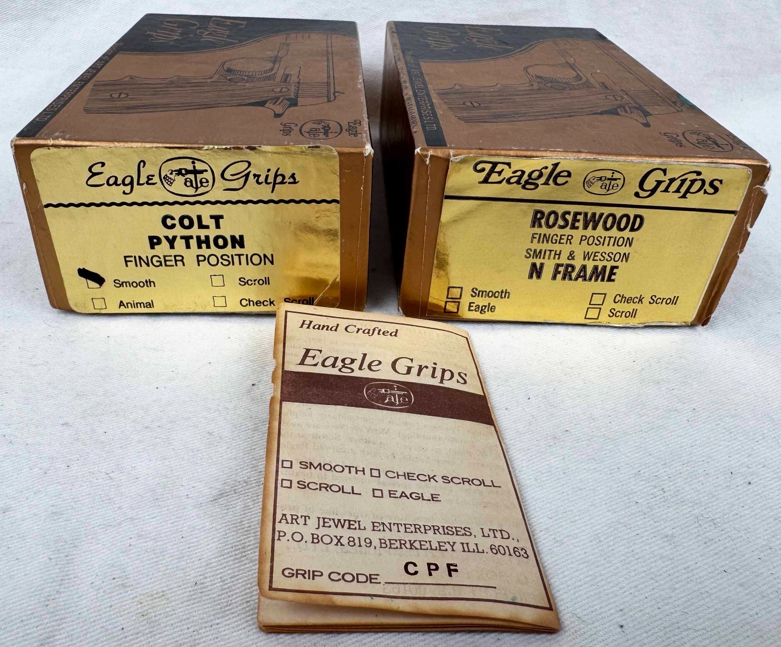 Eagle Grips Colt Python & Rosewood Smith & Wesson Finger Position Empty Box lot. Eagle Grips Colt Python & Rosewood Smith & Wesson Finger Position Empty Box lot.
