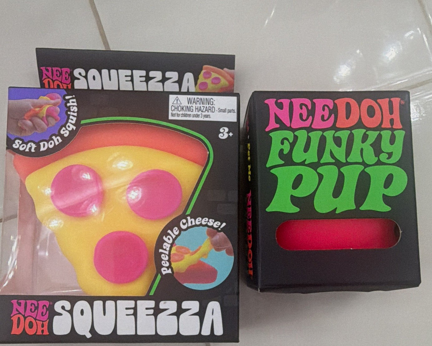 NeeDoh Squeezzza Pizza & Funky Pup Tactile Squeeze Toys Set, 4+ Yellow/Pink NeeDoh Squeezzza Pizza & Funky Pup Tactile Squeeze Toys Set, 4+ Yellow/Pink