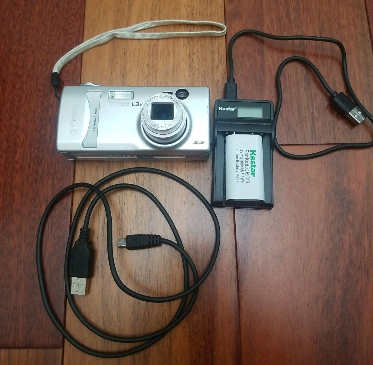 Vintage Kyocera L3V camera with strap 3.2 mega pixels camera Battery & Charger Vintage Kyocera L3V camera with strap 3.2 mega pixels camera Battery & Charger