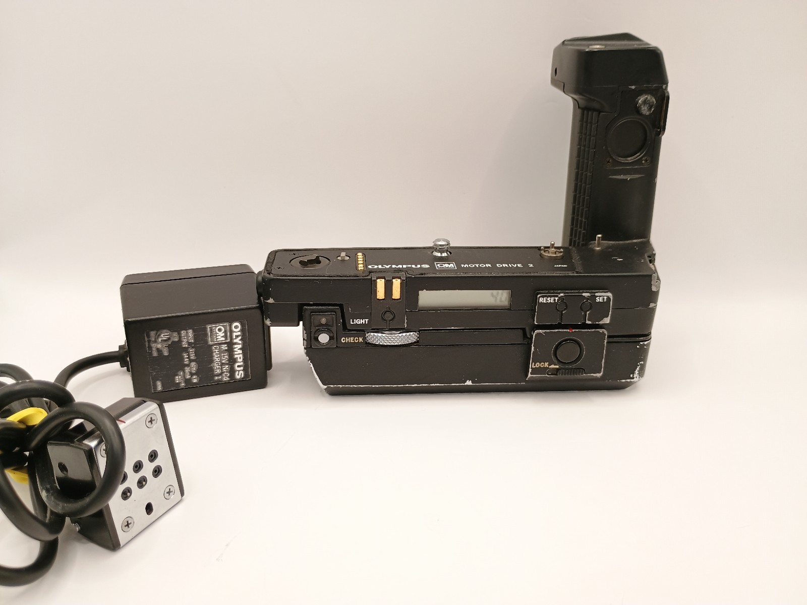 Olympus OM Motor Drive 2 w/ 15v Ni-Cd Control Pack 1 & Adapter, Partially Tested Olympus OM Motor Drive 2 w/ 15v Ni-Cd Control Pack 1 & Adapter, Partially Tested