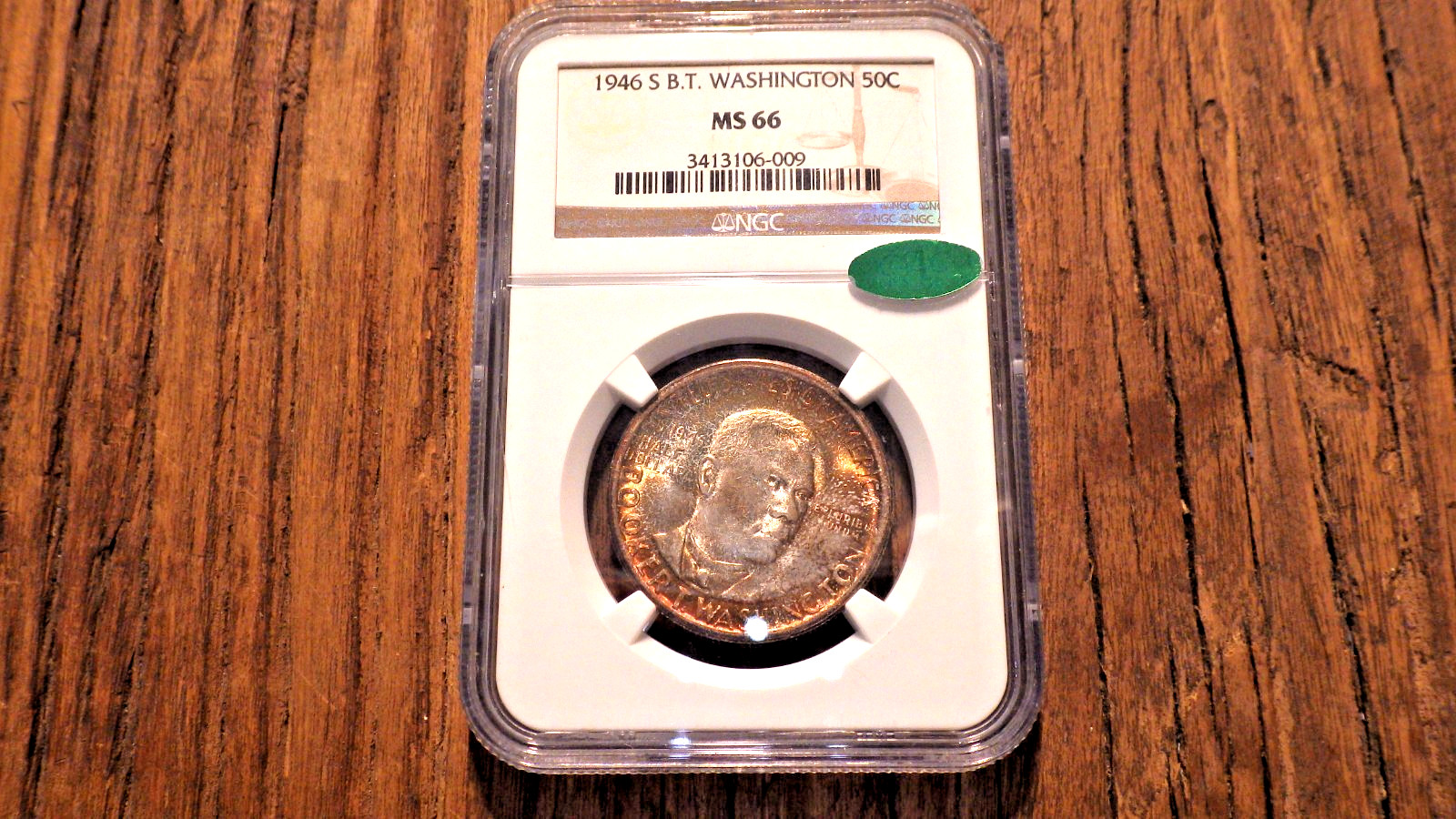 VINTAGE 1946-S B.T. WASHINGTON $.50, NGC SLABBED AND GRADED MS-66 TONED VINTAGE 1946-S B.T. WASHINGTON $.50, NGC SLABBED AND GRADED MS-66 TONED