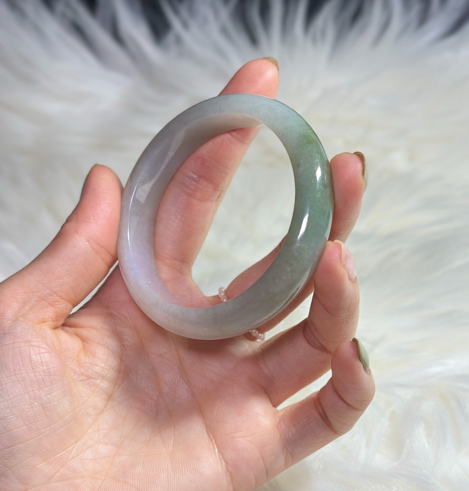 Green & White Burmese Jadeite Round Stone Bangle. Size 55.4 x 12.5 x 7.8 Green & White Burmese Jadeite Round Stone Bangle. Size 55.4 x 12.5 x 7.8