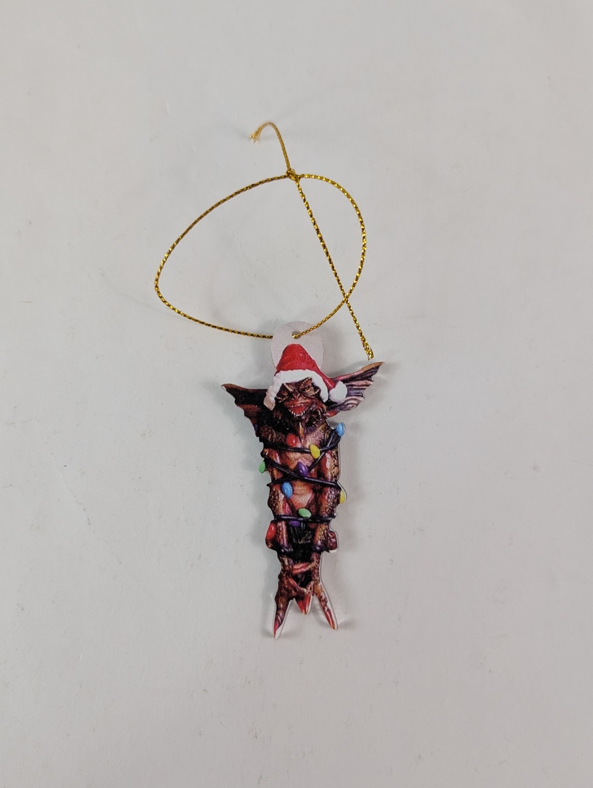 Gremlins Evil Gremlin In Lights With A Santa Hat Plastic Christmas Ornament Gremlins Evil Gremlin In Lights With A Santa Hat Plastic Christmas Ornament
