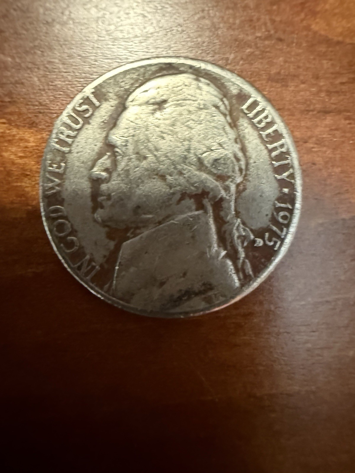 1975 D Nickel with high misplaced mint mark