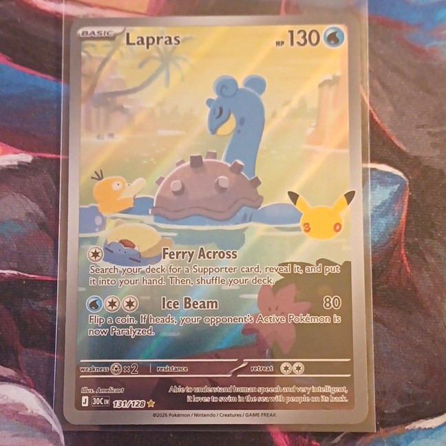 Nintendo Pokémon TCG Lapras 131/128 Me: 30th Celebration Holo Rare ENG 130 HP
