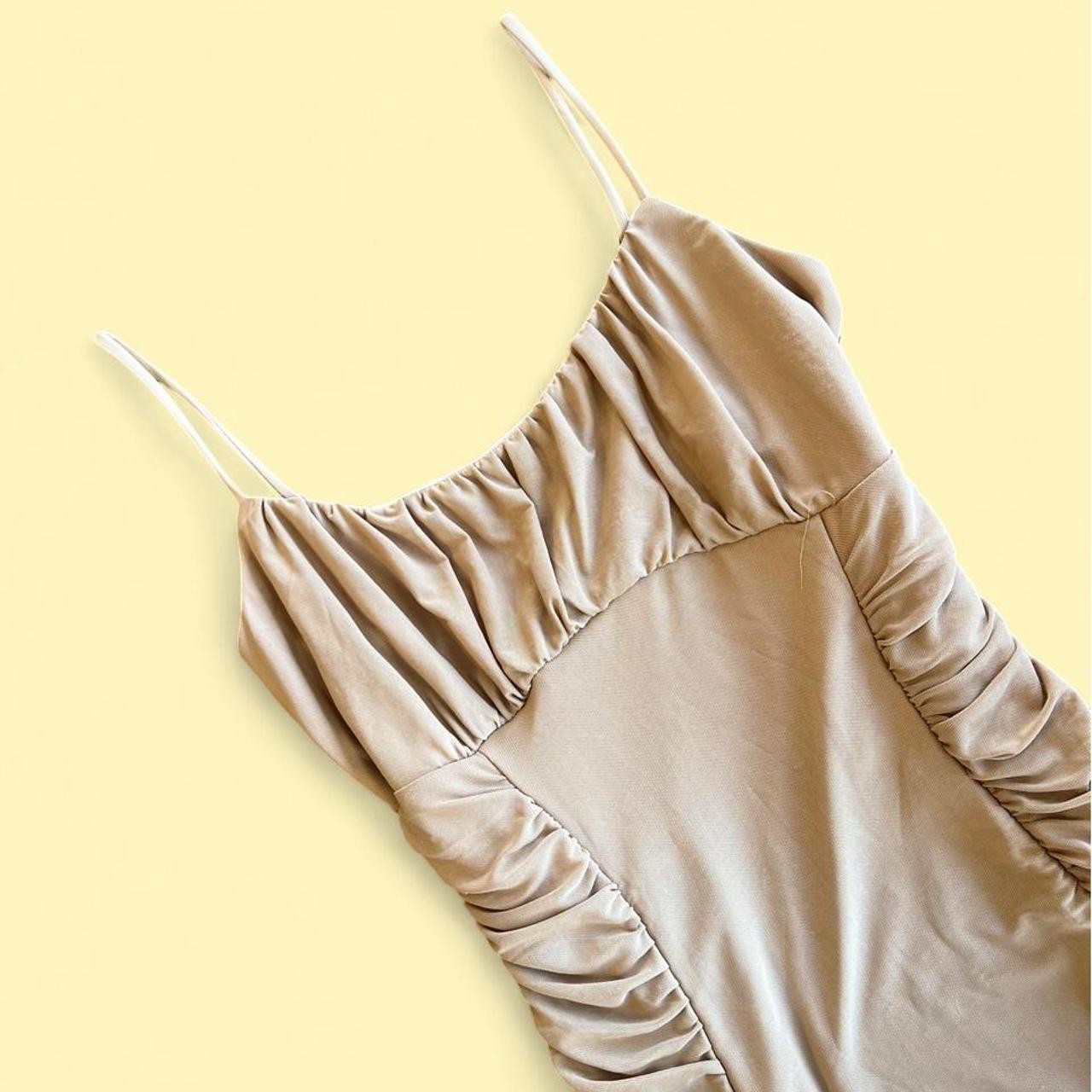 Ribbed Cinched Tan Fitted Homecoming Dress in a size L - Will fit tightly.