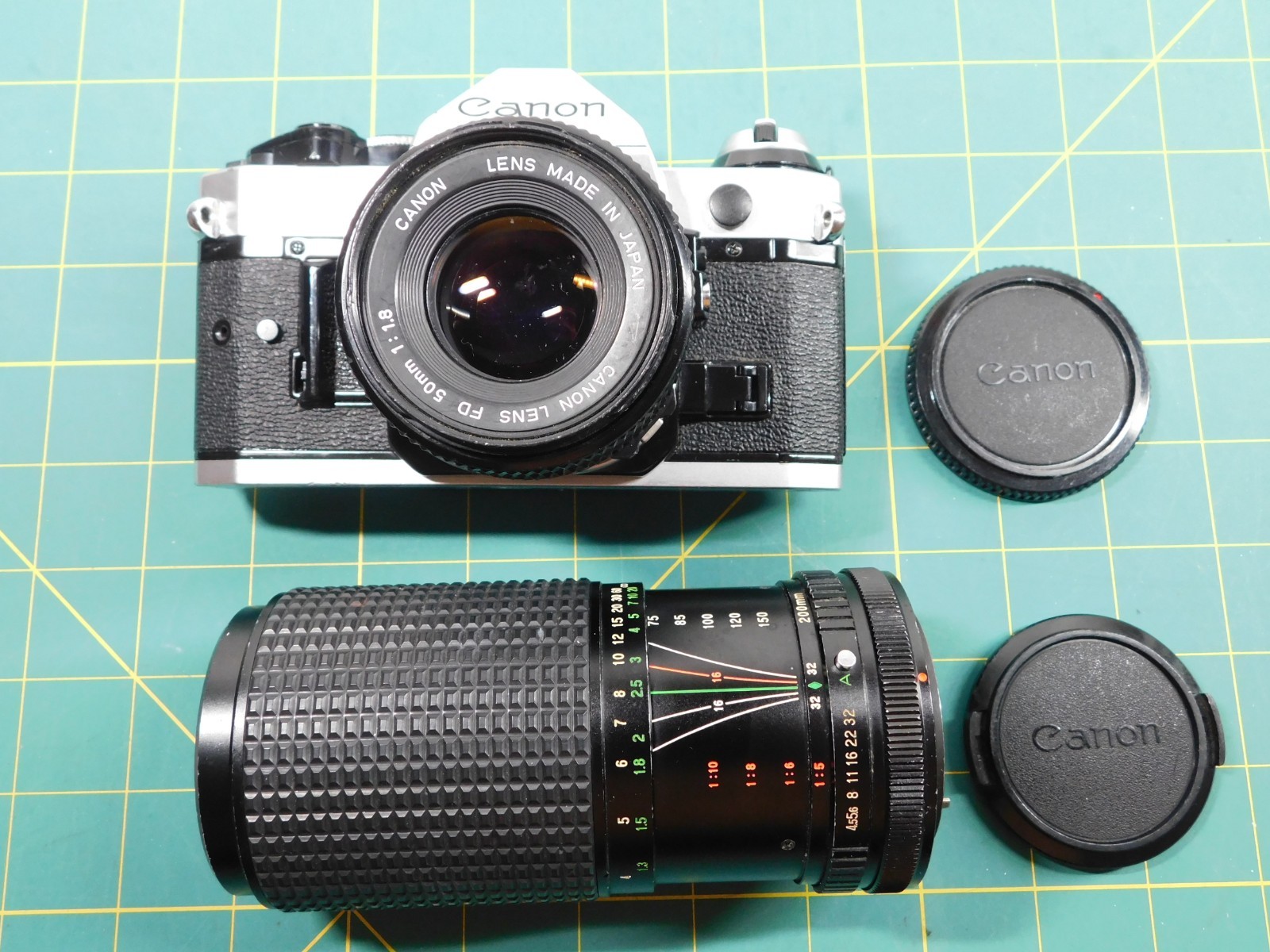 Canon AE-1 Program, Canon 50mm F1.8 & TOU F4.5, 75-200mm Zoom. Tested See Video
