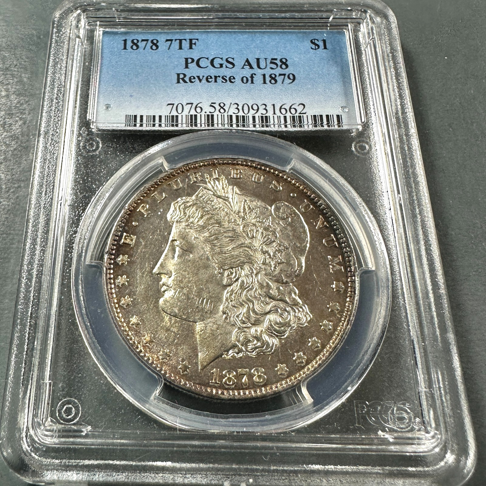 1878 $1 Morgan Silver Dollar, 7TF Reverse of 1879, PCGS AU58 (90712) 1878 $1 Morgan Silver Dollar, 7TF Reverse of 1879, PCGS AU58 (90712)