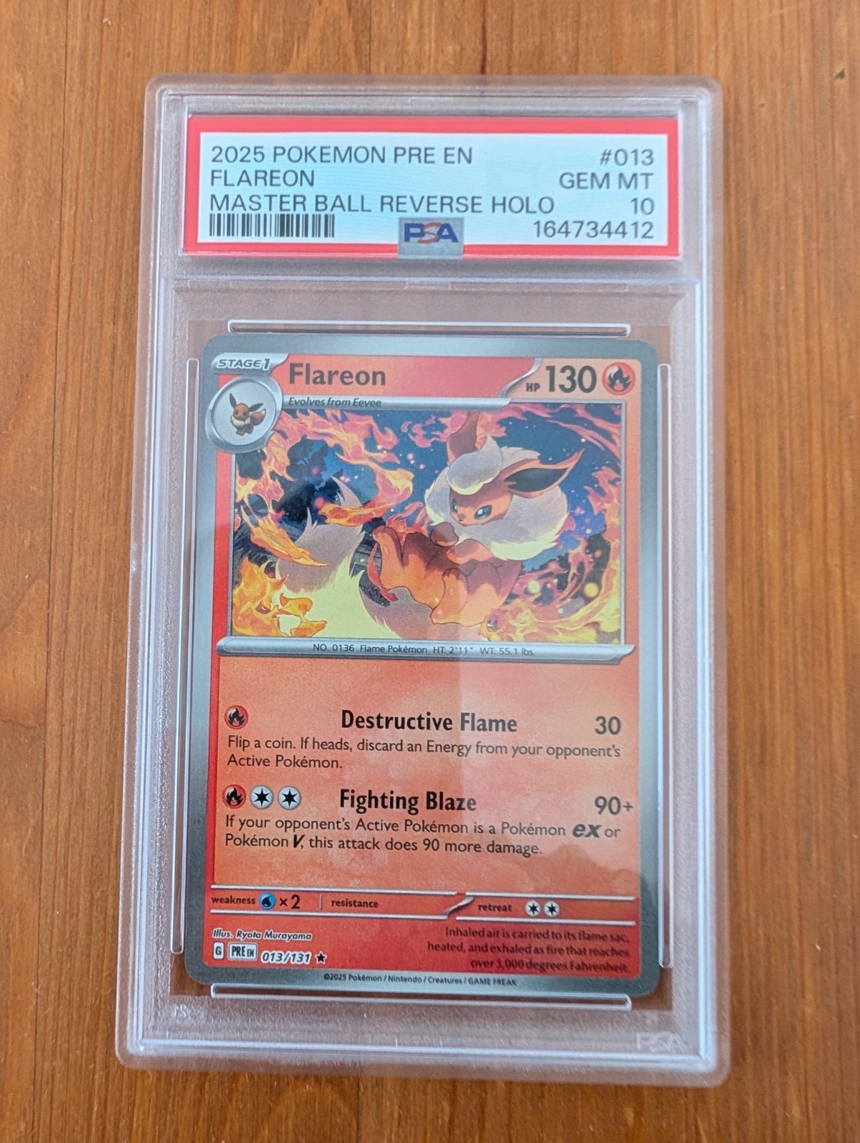 2025 Pokémon Flareon #013 Prismatic Evolutions Master Ball Reverse Holo PSA 10