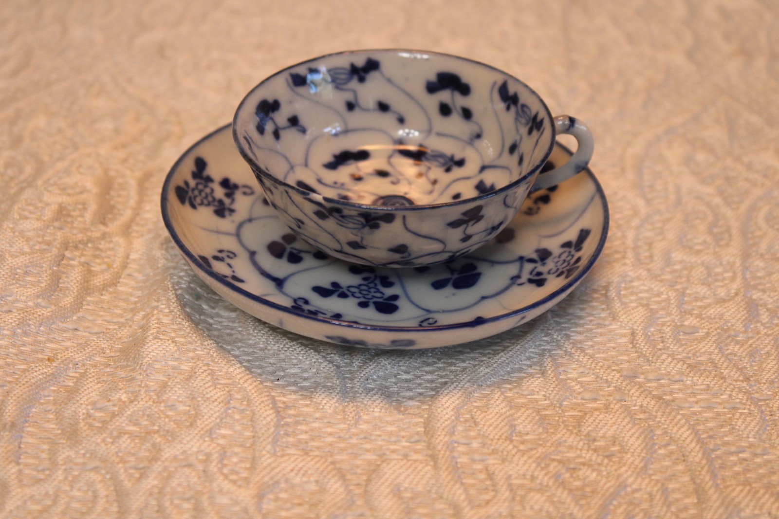 Japan Imari Antique Blue and White Demitasse Cup and Saucer. 1850-1899. Japan Imari Antique Blue and White Demitasse Cup and Saucer. 1850-1899.