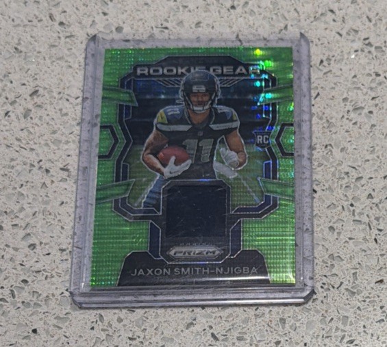 (RC) Jaxon Smith-Njigba Neon Green Pulsar Prizm Rookie Gear 2023 Panini Prizm (RC) Jaxon Smith-Njigba Neon Green Pulsar Prizm Rookie Gear 2023 Panini Prizm