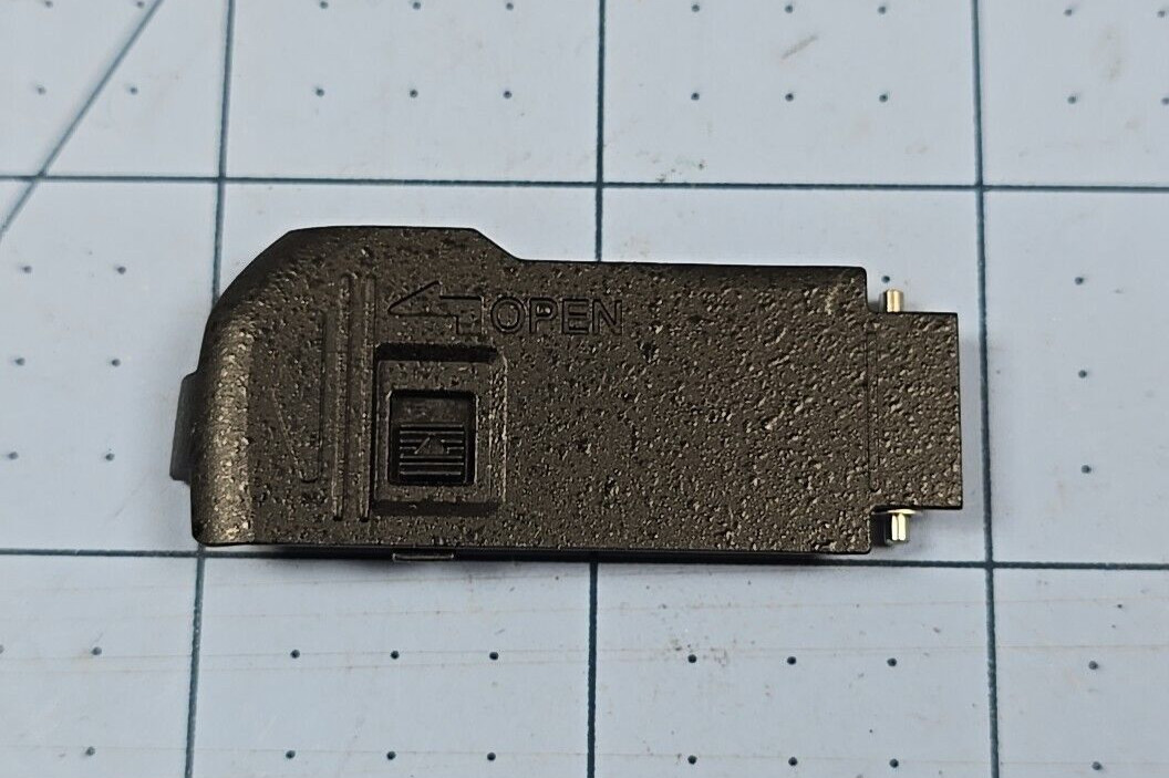 Olympus E-420, E-410, E-450 Battery Plate/Cover OEM Replacement Olympus E-420, E-410, E-450 Battery Plate/Cover OEM Replacement