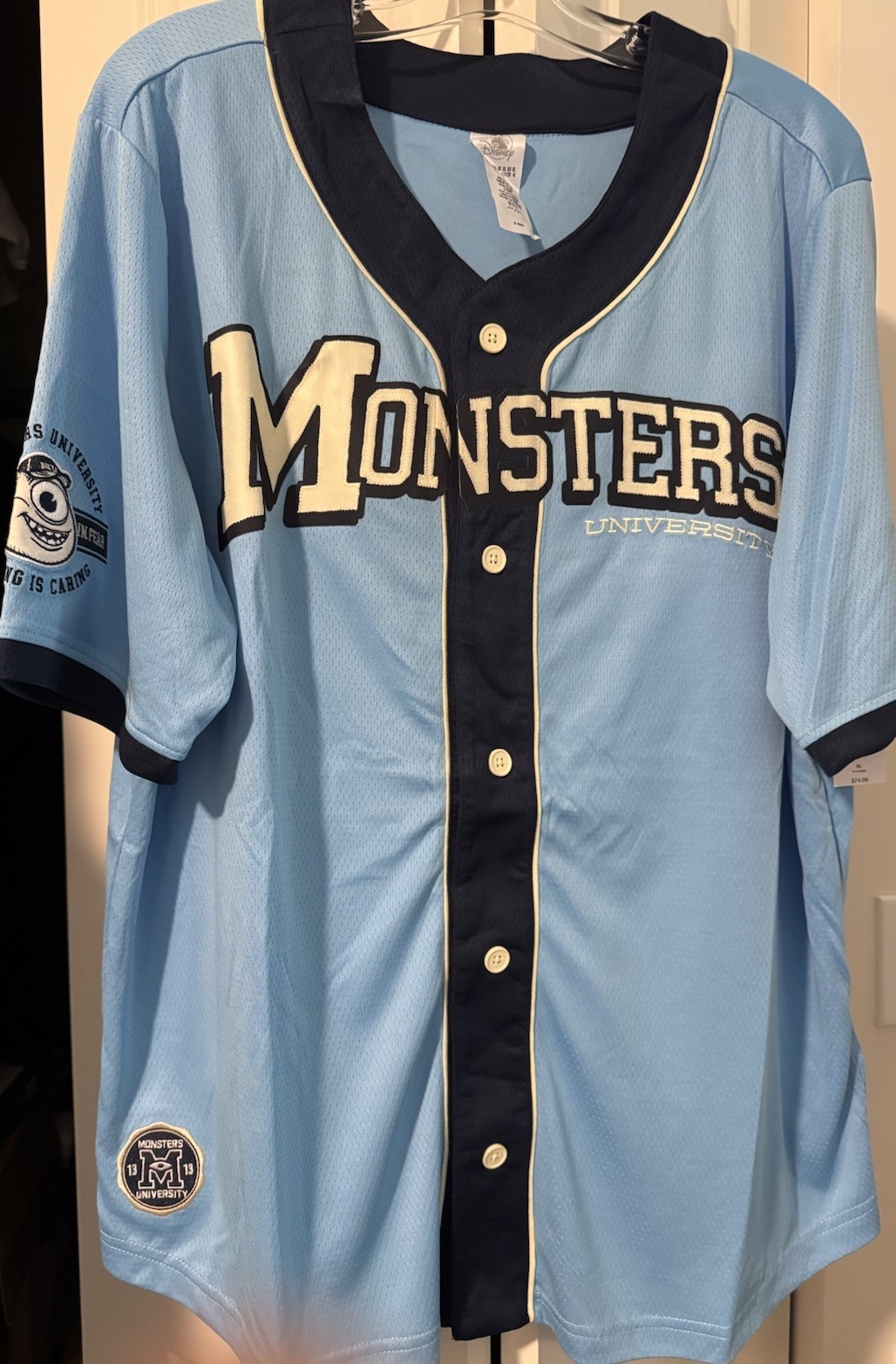 NWT Disney Parks Monsters University Blue Baseball Jersey XL Sully Mike Wozowski NWT Disney Parks Monsters University Blue Baseball Jersey XL Sully Mike Wozowski