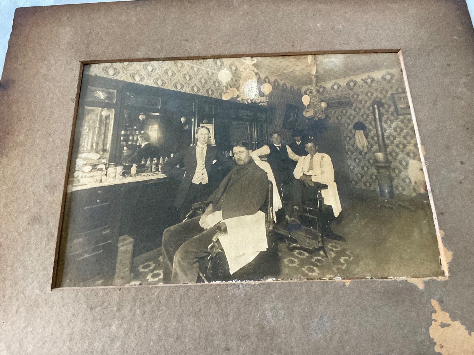 CABINET CARD PRE WWI BARBER SHOP SCENE BARBERS CUSTOMERS TONICS TOOLS STERN CABINET CARD PRE WWI BARBER SHOP SCENE BARBERS CUSTOMERS TONICS TOOLS STERN