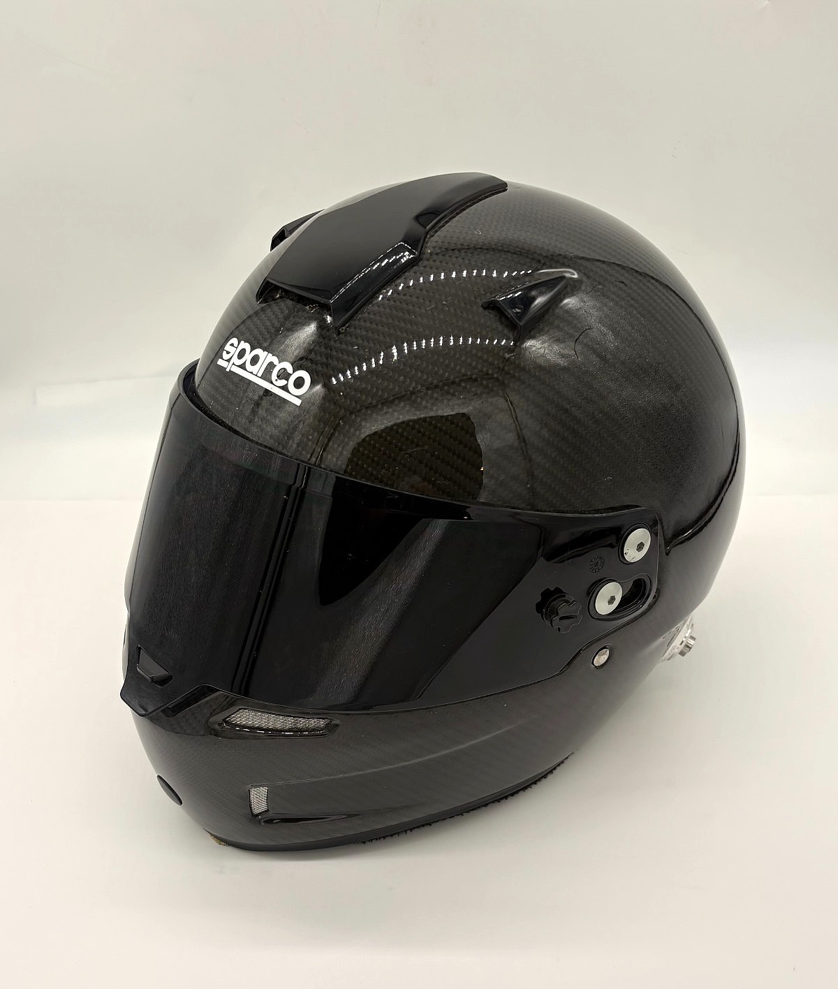 Sparco carbon-fiber full-face racing helmet with an FIA 8850-2010 homologation Sparco carbon-fiber full-face racing helmet with an FIA 8850-2010 homologation