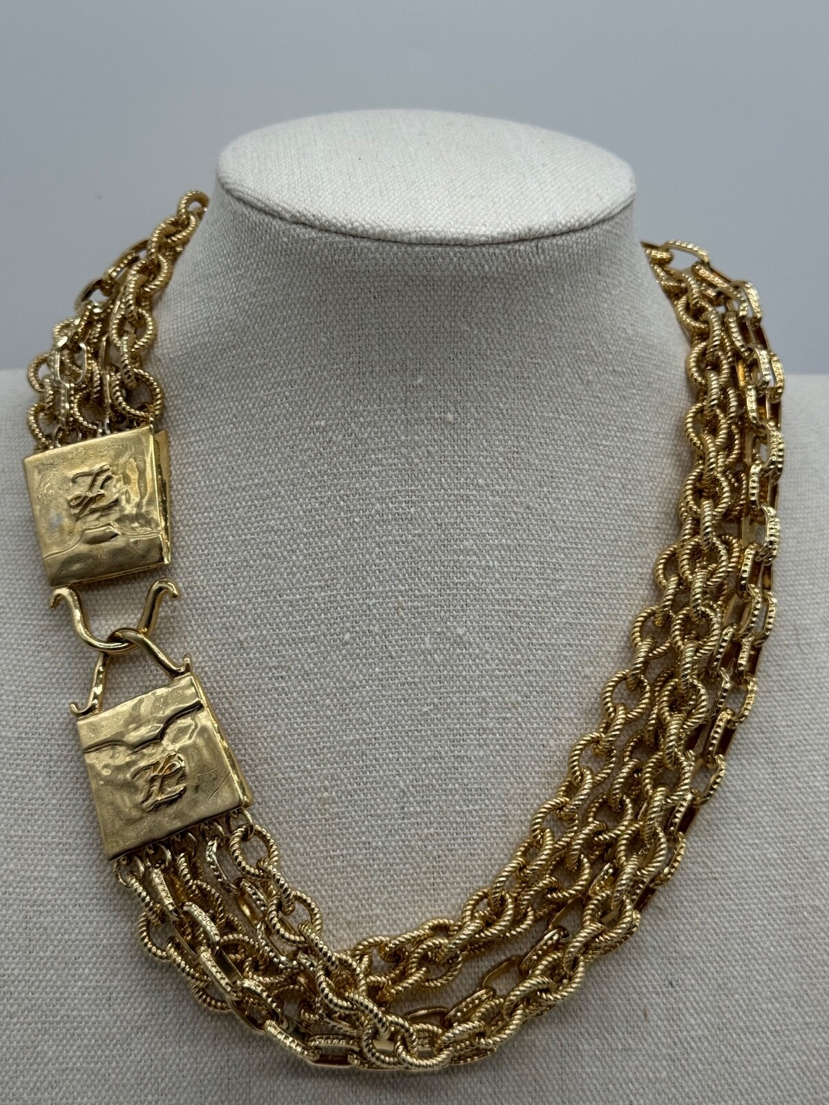 Vintage Karl Lagerfeld Gold Tone Multi Strand Chain Purse Shaped Clasp Necklace Vintage Karl Lagerfeld Gold Tone Multi Strand Chain Purse Shaped Clasp Necklace