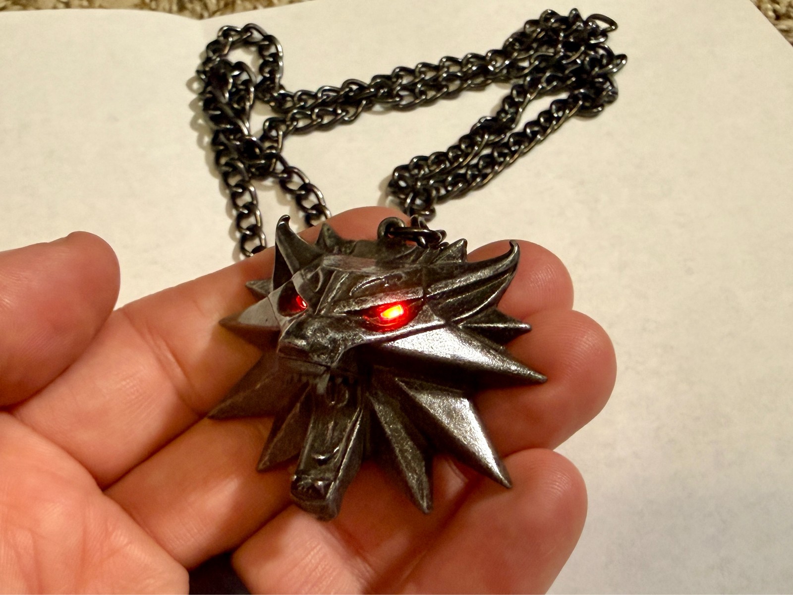 The Witcher 3 White Wolf Medallion LED Necklace from JNX and cd Projekt RED The Witcher 3 White Wolf Medallion LED Necklace from JNX and cd Projekt RED