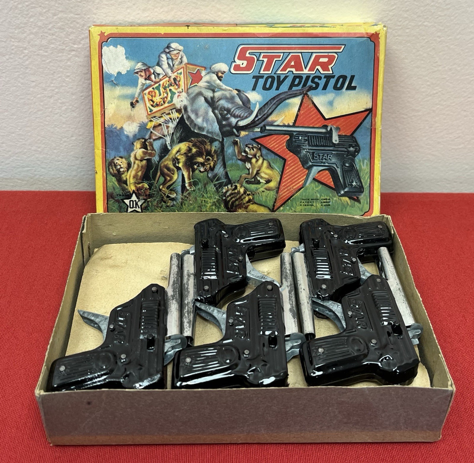 Original 1950s-60s O.K Star Tin Toy Pistols in Salesman’s Store Box - 11 Count Original 1950s-60s O.K Star Tin Toy Pistols in Salesman’s Store Box - 11 Count