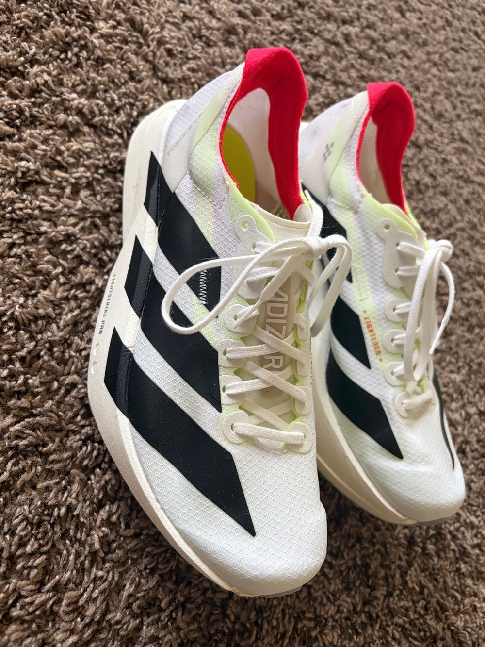 NWOT Adidas ADIZERO ADIOS PRO 4 - Size 8 NWOT Adidas ADIZERO ADIOS PRO 4 - Size 8