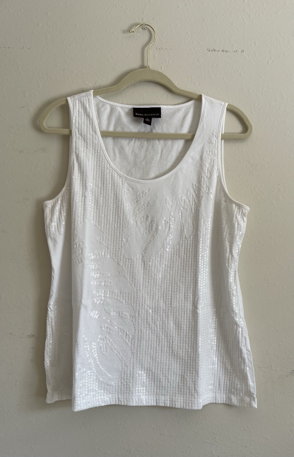 Dana Buchman scoop-neck tank top featuring a subtle, tonal sequin palm leaf. Dana Buchman scoop-neck tank top featuring a subtle, tonal sequin palm leaf.