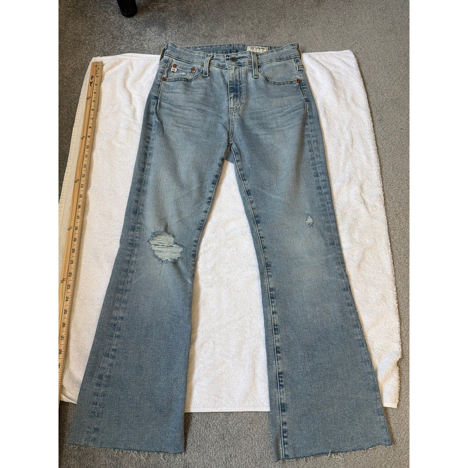 AG Jeans (Adriano Goldschmied) Jeans Size 27 Light Wash distressed flare raw hem