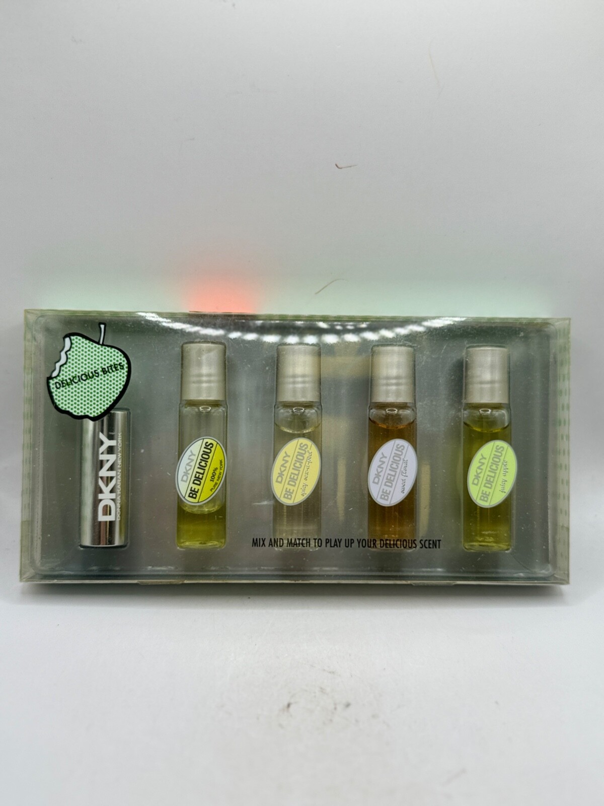 DELICIOUS APPLE-ESSENCES BY DNKY 5MLX4 EDP ROLLERBALL (NEW WITH BOX)