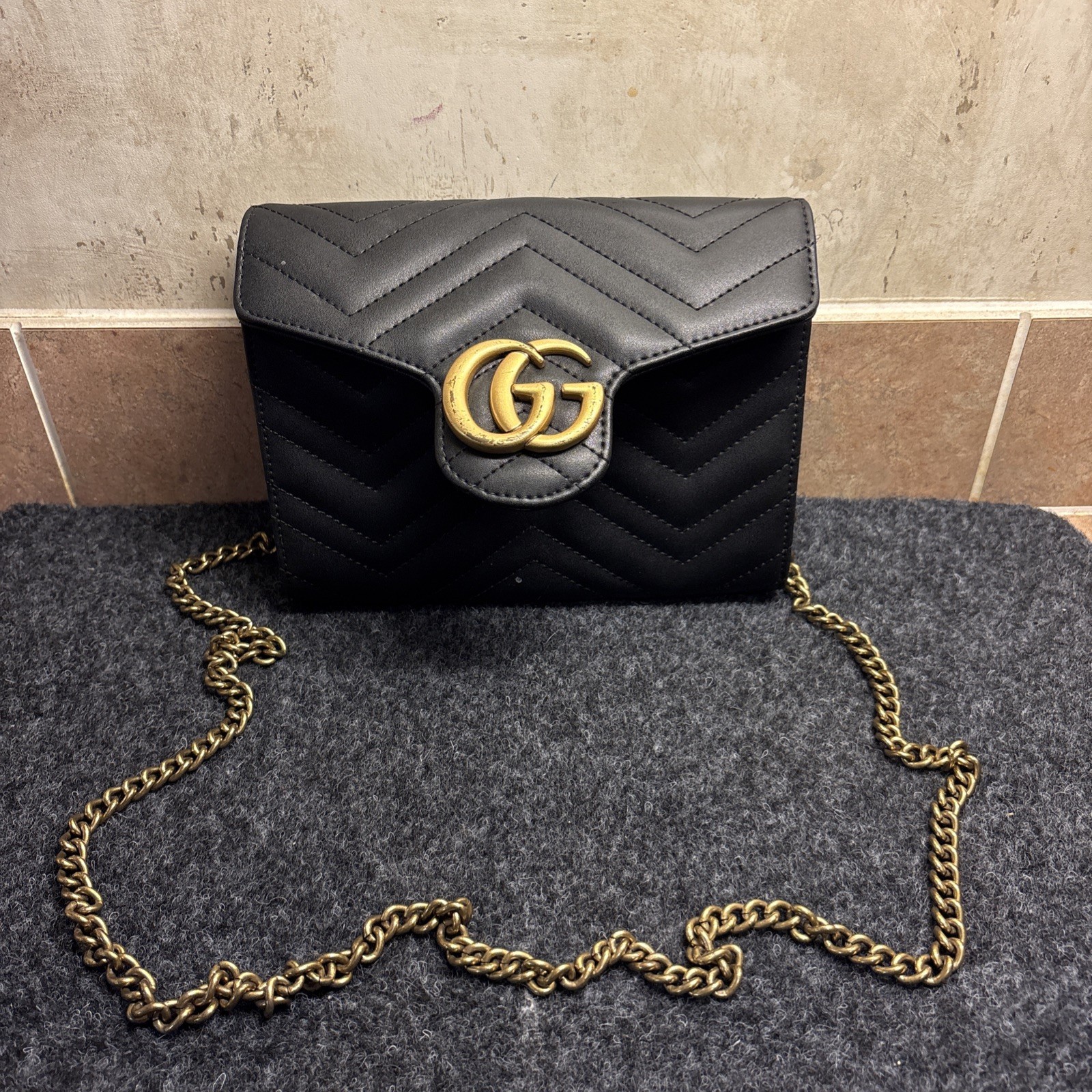 Gucci GG Marmont Chevron Black Quilted Wallet Purse on Gold Chain