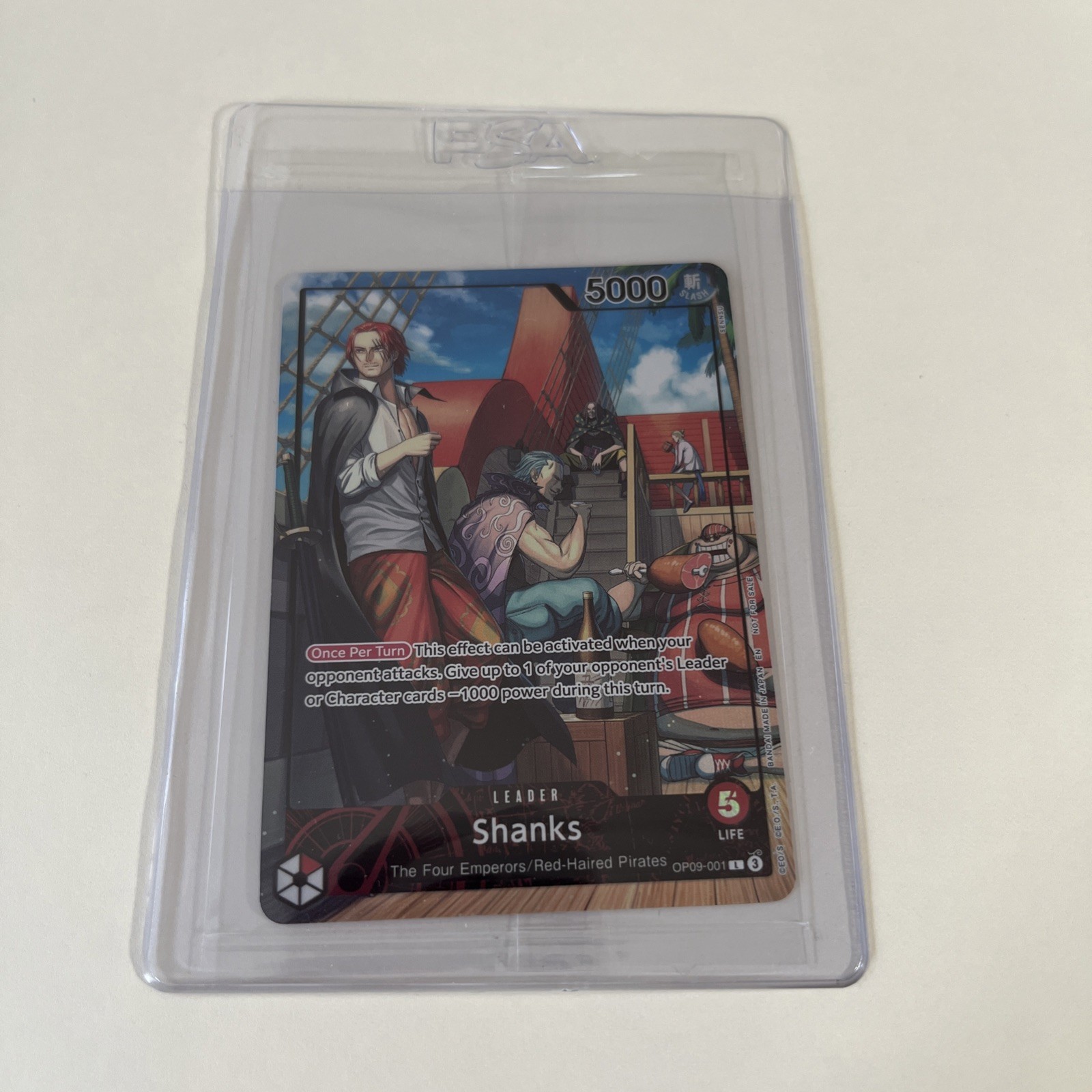 Shanks - One Piece TCG OP09-001 PSA Magazine Promo Foil - SEALED Shanks - One Piece TCG OP09-001 PSA Magazine Promo Foil - SEALED