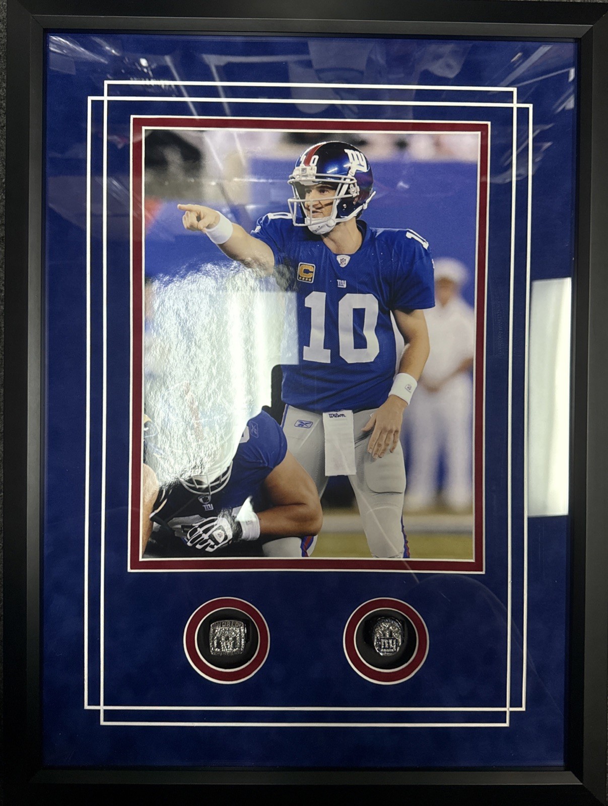 Eli Manning Framed Photo With Replica Rings Eli Manning Framed Photo With Replica Rings