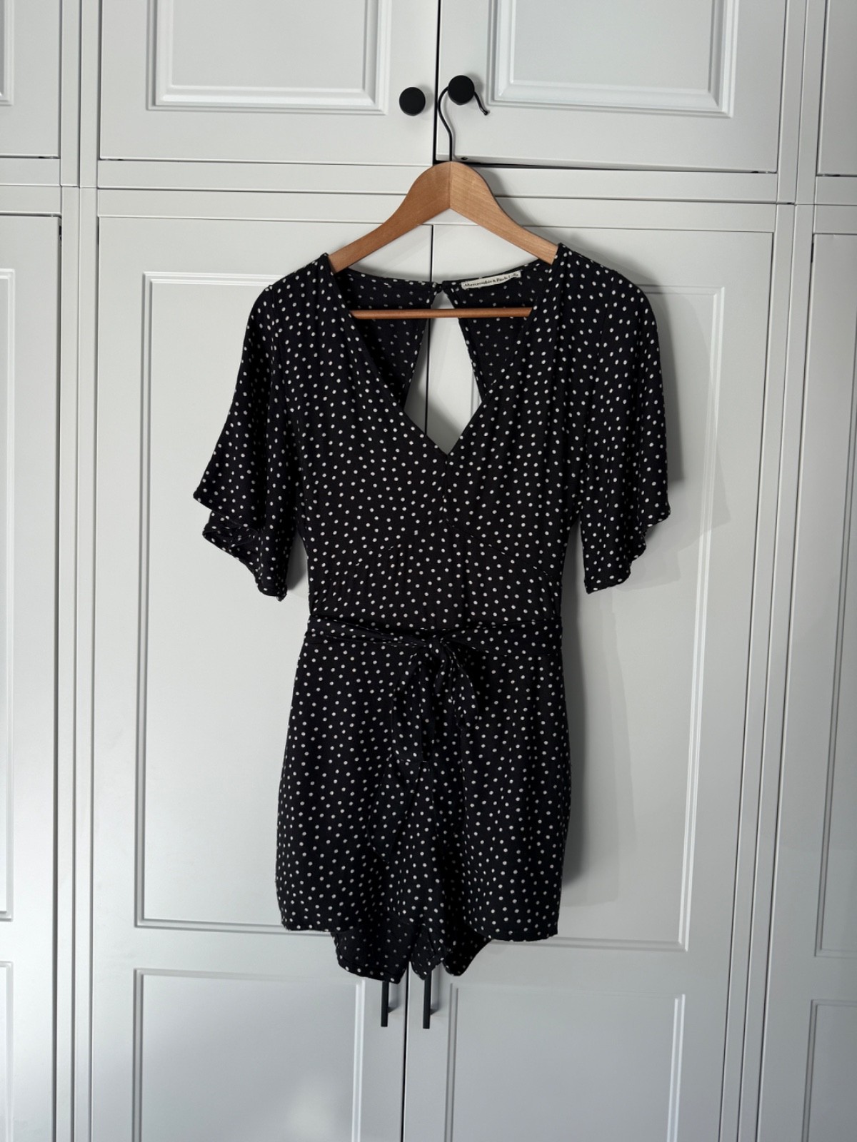 Abercrombie polka dot open back, tie waist romper w/ pockets and ruffle sleeves Abercrombie polka dot open back, tie waist romper w/ pockets and ruffle sleeves