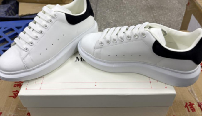 Alexander McQueen Oversized White Leather Sneakers Black Heel Tab